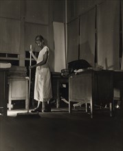 Washington, D.C. Government charwoman cleaning after regular working hours. [Mrs Ella Watson].
