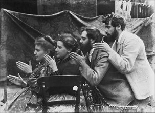 Esther Pissarro, Alice Isaacson, Lucien and Georges Pissarro pretending to be a train, 1890.