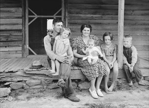Wife and children of tobacco sharecropper on front porch. Person County, North Carolina.