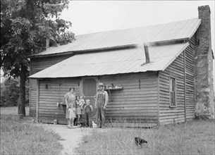 Tobacco sharecroppers and family at back of their house. Person County, North Carolina.