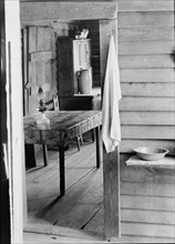 Washstand in the dog run and kitchen of Floyd Burroughs' cabin. Hale County, Alabama.