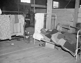 Sick flood refugee in the Red Cross temporary infirmary at Forrest City, Arkansas.