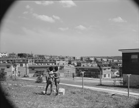 Anacostia, D.C. Frederick Douglass housing project. Boys overlooking the project.