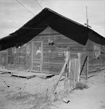 Family living in shacktown community. Washington, Yakima Valley, Wapato.