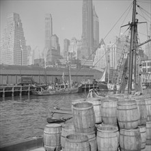 New York, New York. Barrels for loading fish at the Fulton fish market.