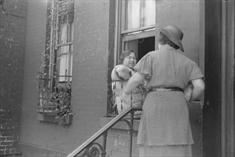 New York, New York. 61st Street between 1st and 3rd Avenues. Tenants.