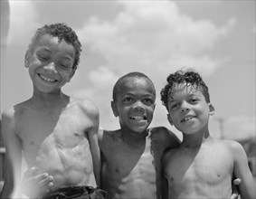 Anacostia, D.C. Frederick Douglass housing project. Three youngsters.