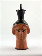 Oinochoe (Pitcher) in the Shape of a Female Head, about 450 BCE.