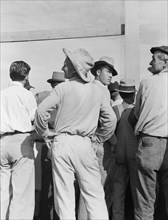 Watching ball game. Shafter migrant camp. California.