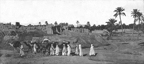 ''A Caravan approaching an old Fort in Biskra', 1890.