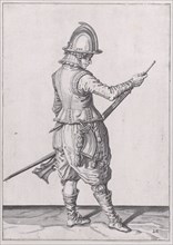 A soldier ramming home powder and bullet with the ramrod, from the Marksmen seri..., published 1608. Creator: Robert Willemsz de Baudous.