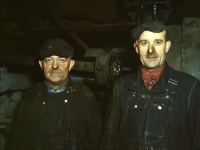 Workers at the roundhouse of the C & NW RR Proviso Yard, Chicago, Ill., 1942. Creator: Jack Delano.