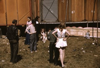Backstage at the "girlie" show at the Vermont state fair, Rutland, 1941. Creator: Jack Delano.
