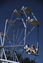 On the ferris wheel at the Vermont state fair, Rutland, 1941. Creator: Jack Delano.