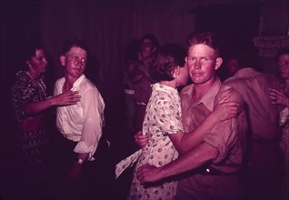 Couples at square dance, McIntosh County, Oklahoma, 1939 or 1940. Creator: Russell Lee.