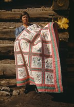 Mrs. Bill Stagg with state quilt, Pie Town, New Mexico, 1940. Creator: Russell Lee.