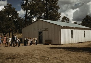 The school at Pie Town, New Mexico in the Farm Bureau building, 1940. Creator: Russell Lee.