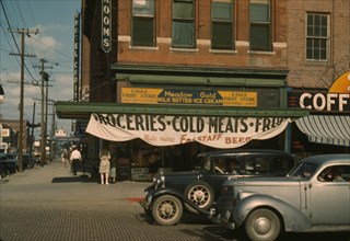 Eagle Fruit Store and Capital Hotel, Lincoln, Nebraska, 1942. Creator: John Vachon.