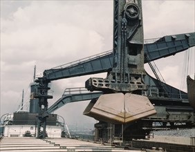Pennsylvania R.R. ore docks, unloading ore from a lake freighter by means..., Cleveland, Ohio, 1943. Creator: Jack Delano.