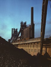 Blast furnaces and iron ore at the Carnegie-Illinois Steel Corporation mills, Etna, Pennsylvania, 19 Creator: Alfred T Palmer.
