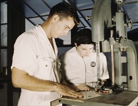 NYA employees receiving training in the Assem..., U.S. Naval Air Base, Corpus Christi, Texas, 1942. Creator: Howard Hollem.