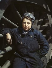 C. & N.W. R.R., Mrs. Dorothy Lucke, employed as a wiper at the roundhouse, Clinton, Iowa, 1943. Creator: Jack Delano.