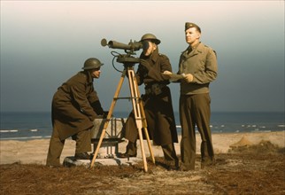 Men of Fort Story operate an azimuth instrument, to measure the angle..., Fort Story, Va., 1942. Creator: Alfred T Palmer.