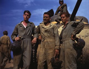 Tank crew standing in front of M-4 tank, Ft. Knox, Ky., 1942. Creator: Alfred T Palmer.