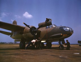 Servicing [an] A-20 bomber, Langley Field, Va., 1942. Creator: Alfred T Palmer.