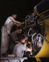 Making wiring assemblies at a junction box..., North American Aviation, Inc., Inglewood, CA, 1942. Creator: Alfred T Palmer.