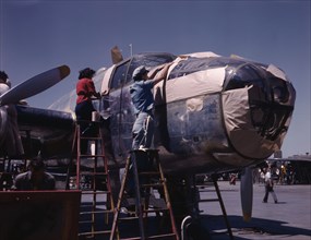 North American B-25 bomber is prepared...North American Aviation, Inc., Inglewood, Calif., 1942. Creator: Alfred T Palmer.