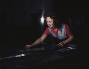 Metal parts are placed on masonite by..., North American Aviation, Inc., Inglewood, Calif., 1942. Creator: Alfred T Palmer.