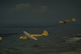 Marine Corps gliders in flight out of Parris Island, S.C., 1942. Creator: Alfred T Palmer.
