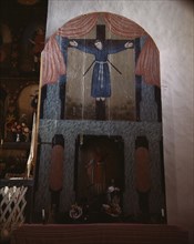 Side altar in the church dedicated to San Lorenzo and San Felipe de Jesus, Trampas, New Mexico, 1943 Creator: John Collier.