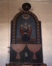 An altar in the church dedicated to the Trinity, Trampas, N.M., 1943. Creator: John Collier.