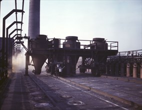 Coal feeders on tip of coke ovens...of the Great Lakes Steel Corporation, Detroit, Mich., 1942. Creator: Arthur S Siegel.