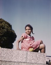 Little girl in a park near Union Station, Washington, D.C., ca. 1943. Creator: Unknown.