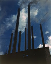 Smoke stacks, 1942. Creator: Alfred T Palmer.