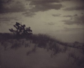 Landscape of sand dunes, c1900.