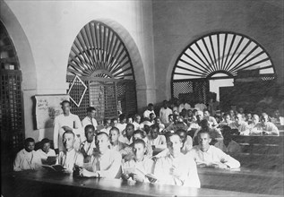 Puerto Rico Schools, 1912. [Men in a classroom].