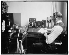 Radio, between 1910 and 1920. Ticker tape machine, USA.