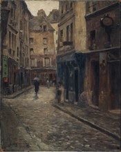 Rue de Lanneau. In rain , c1902.