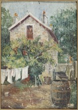 Courtyard with clothes drying, c1900.