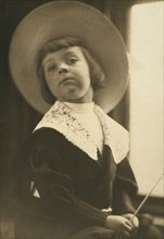Portrait of a boy in a round hat, c1900.