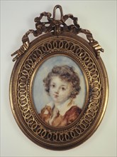 Portrait en buste d'un jeune garçon.
