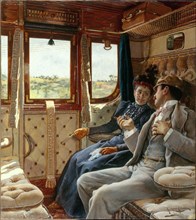 Couple in a train compartment, c1895.