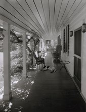Owings Mills, Baltimore, Maryland, 1933. [Veranda with dog asleep].