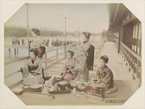 Japanese women at a meal in Kyoto, Between 1870 and 1890. Private Collection.