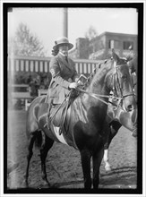 Horse shows, Miss Alice Munn, between 1910 and 1917. Woman riding sidesaddle.