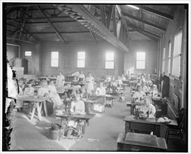 Mrs. Doyen's Red Cross workroom, between 1910 and 1920.